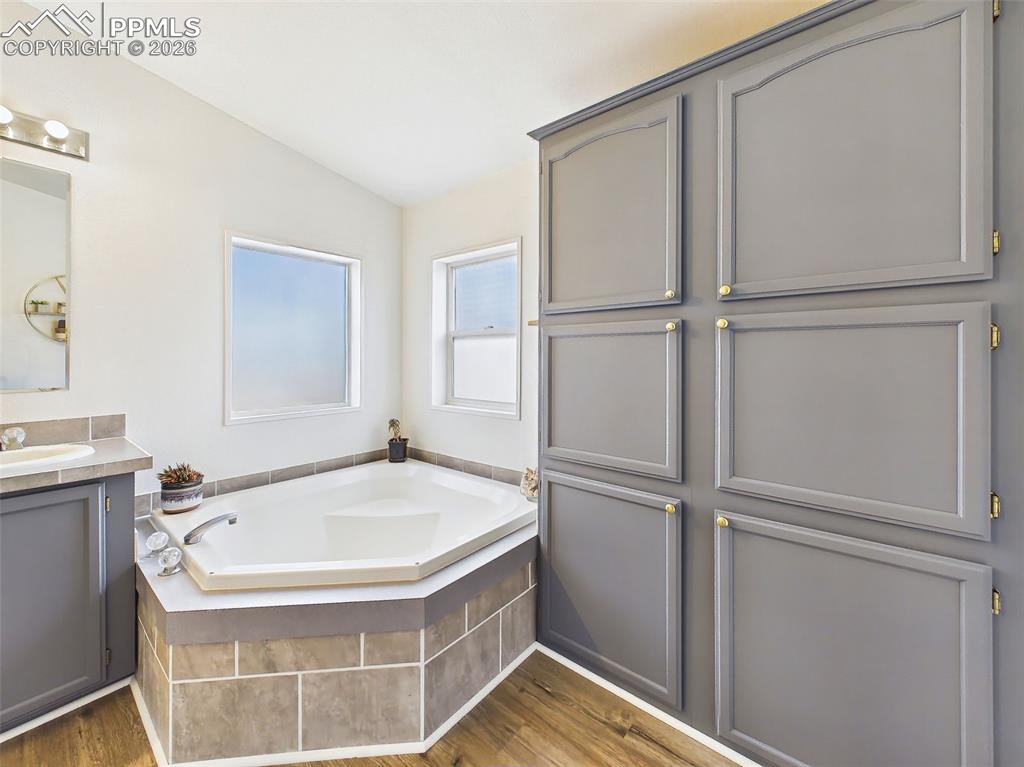 Image 25 of 50: Primary Bathroom – Soaking Tub – Corner soaking tub with tiled surround pro