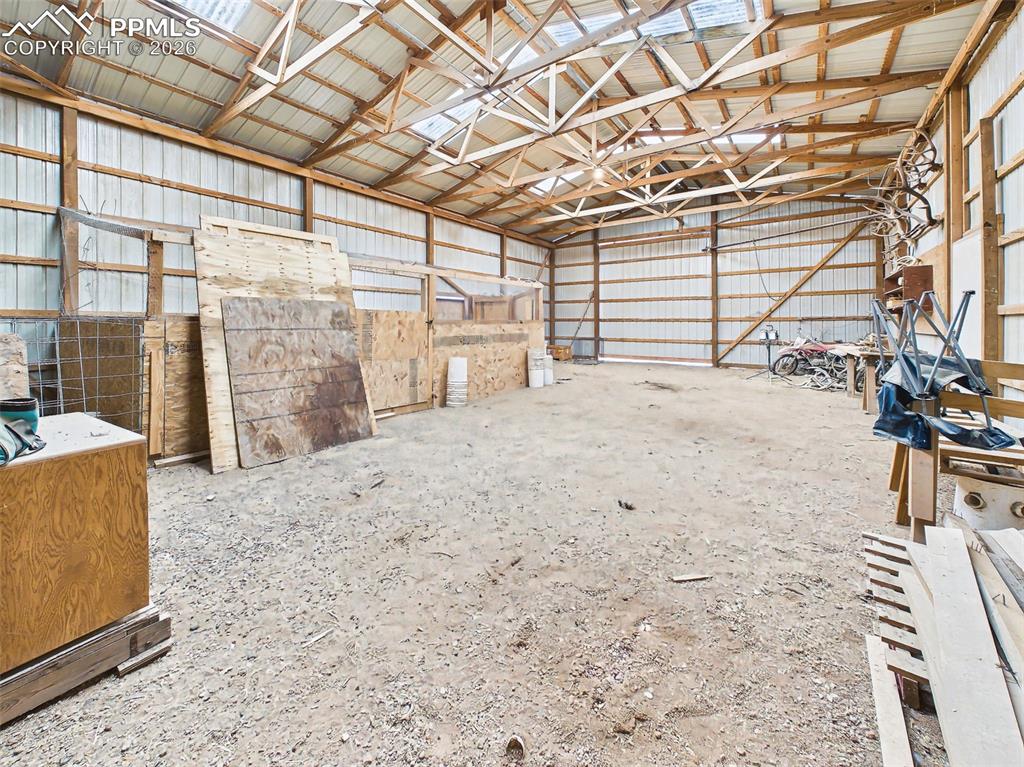 Image 39 of 50: Pole Barn – Alternate Interior Angle – Open layout with natural light panel