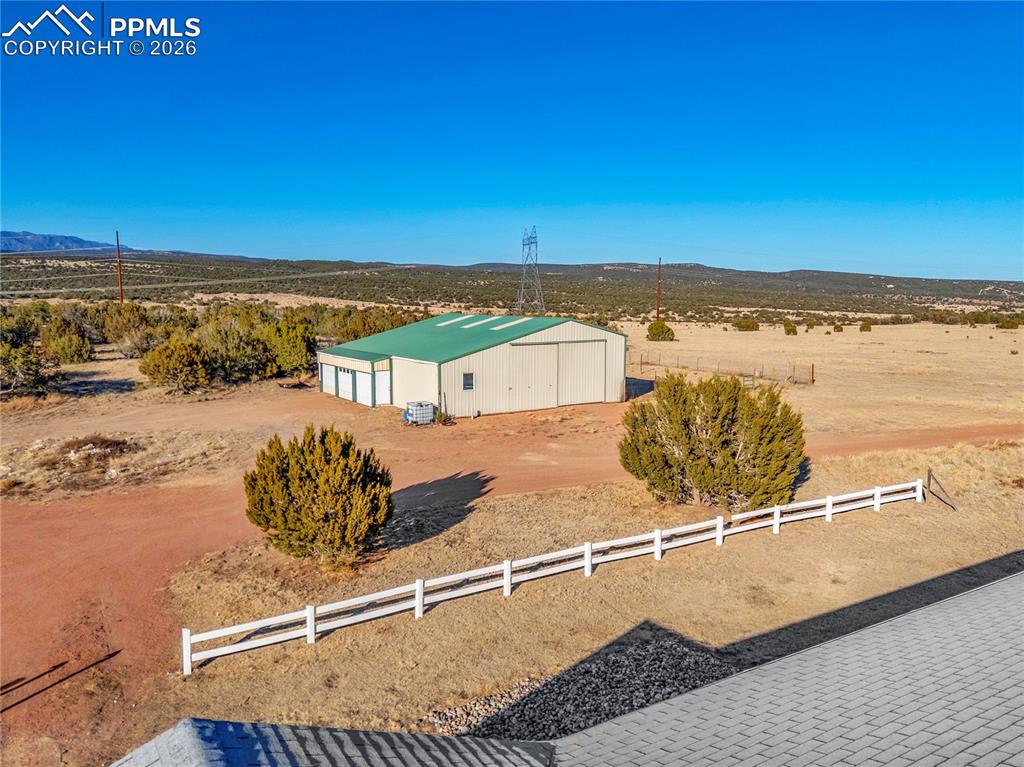 Image 47 of 50: Aerial View – Outbuilding & Fencing – Clear overhead view illustrating the 