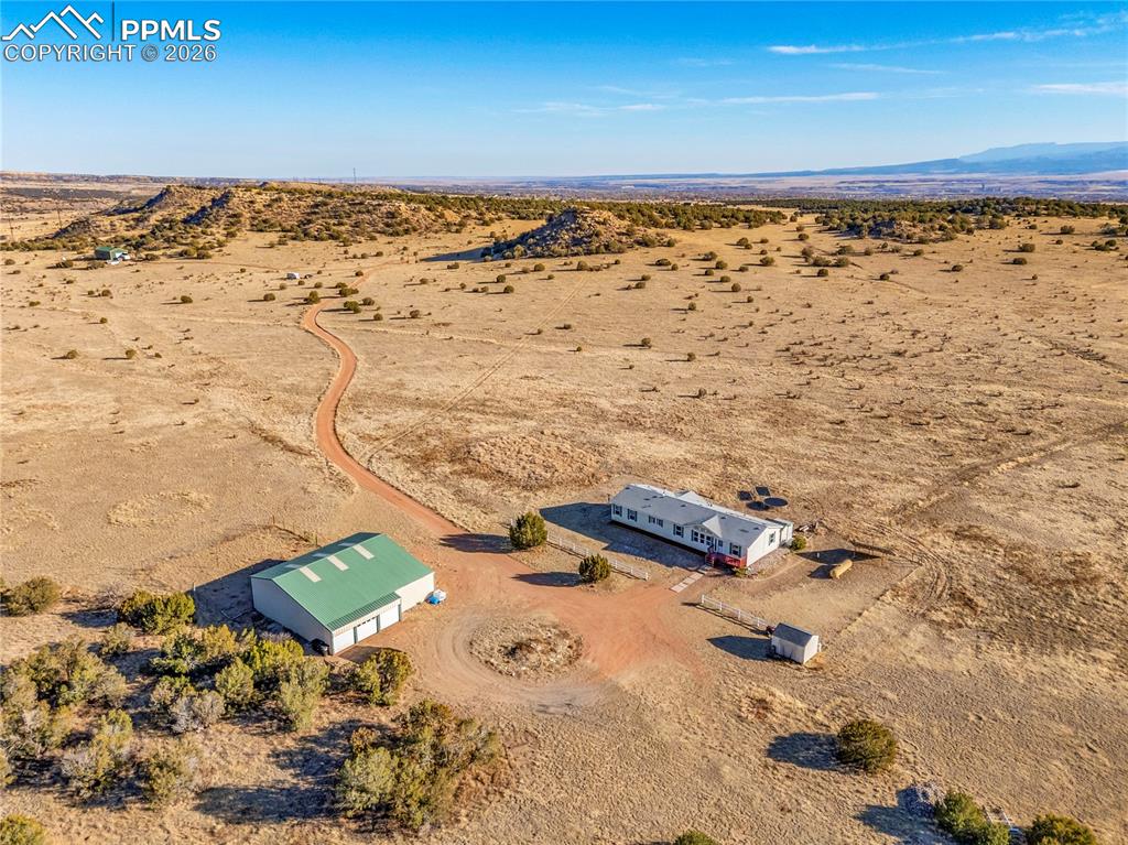 Image 49 of 50: Aerial View – Pole Barn Exterior – Elevated angle showcasing the 30’ x 50’ 