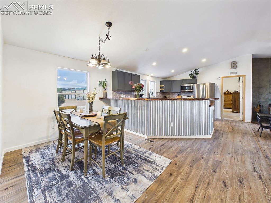 Image 6 of 50: Kitchen & Dining – Open Concept – Remodeled kitchen opens to the dining are