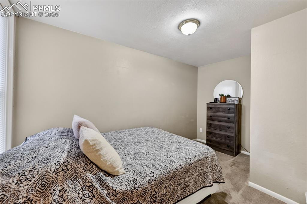 Image 18 of 26: Bedroom