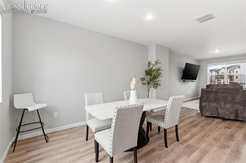 Image 12 of 38: Another look at dining area