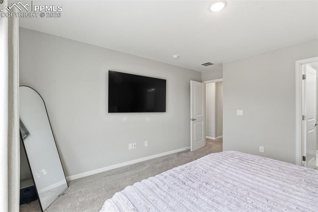 Image 16 of 38: Primary bedroom