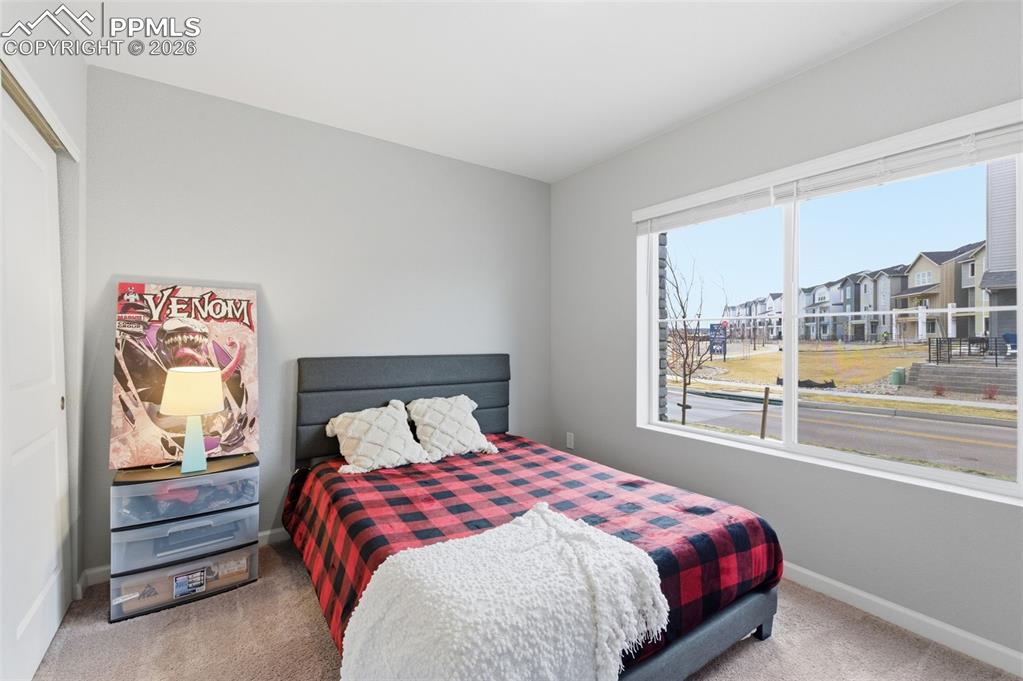 Image 25 of 38: 4th bedroom located on ground level