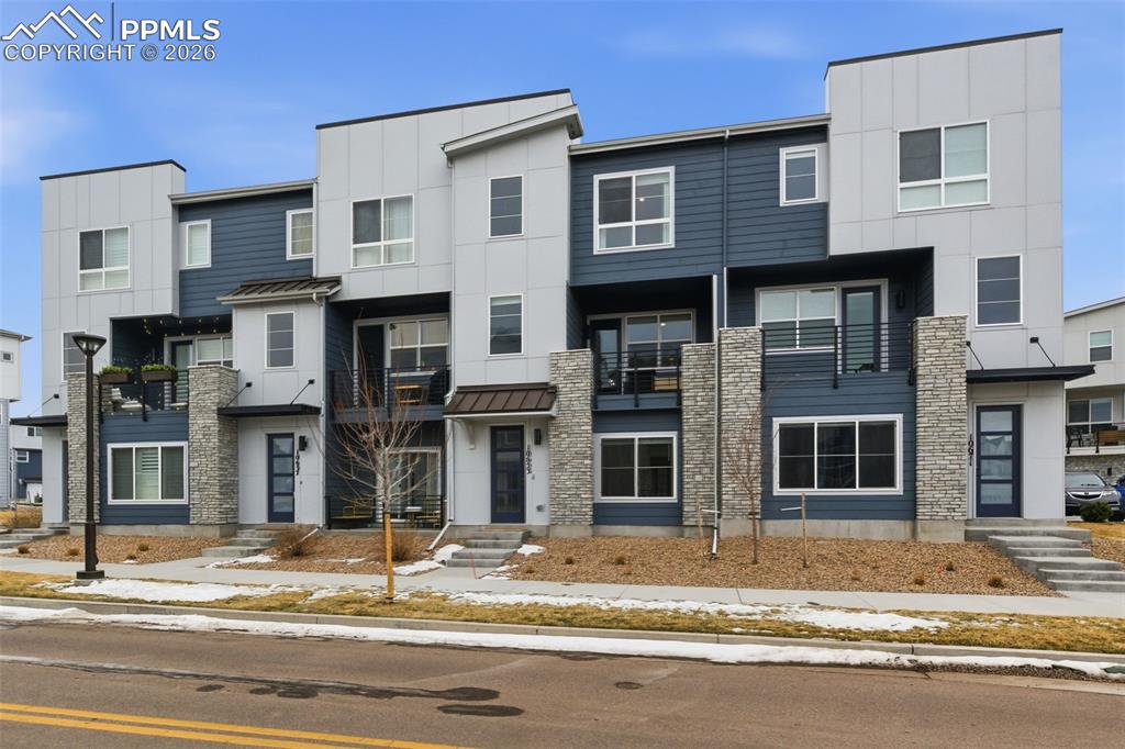 Image 28 of 38: Home is located in the center of these homes