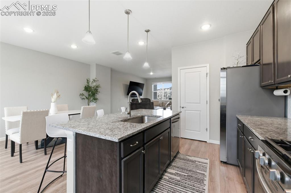 Image 9 of 38: Granite countertops are throughout home