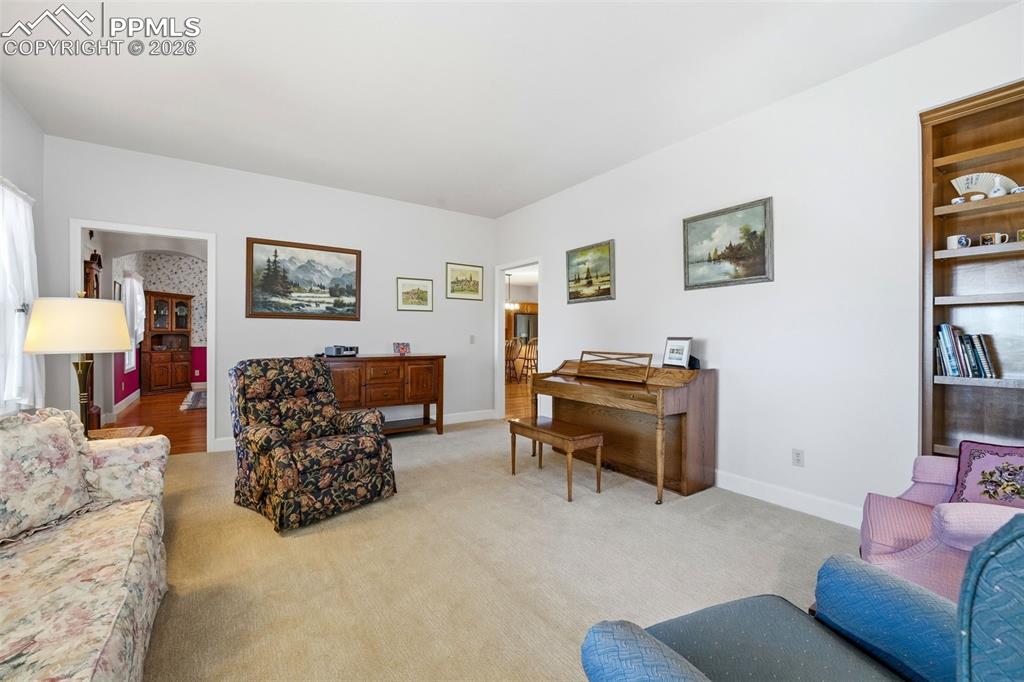 Image 17 of 47: Cozy Wood-Burning Stove in Family Room