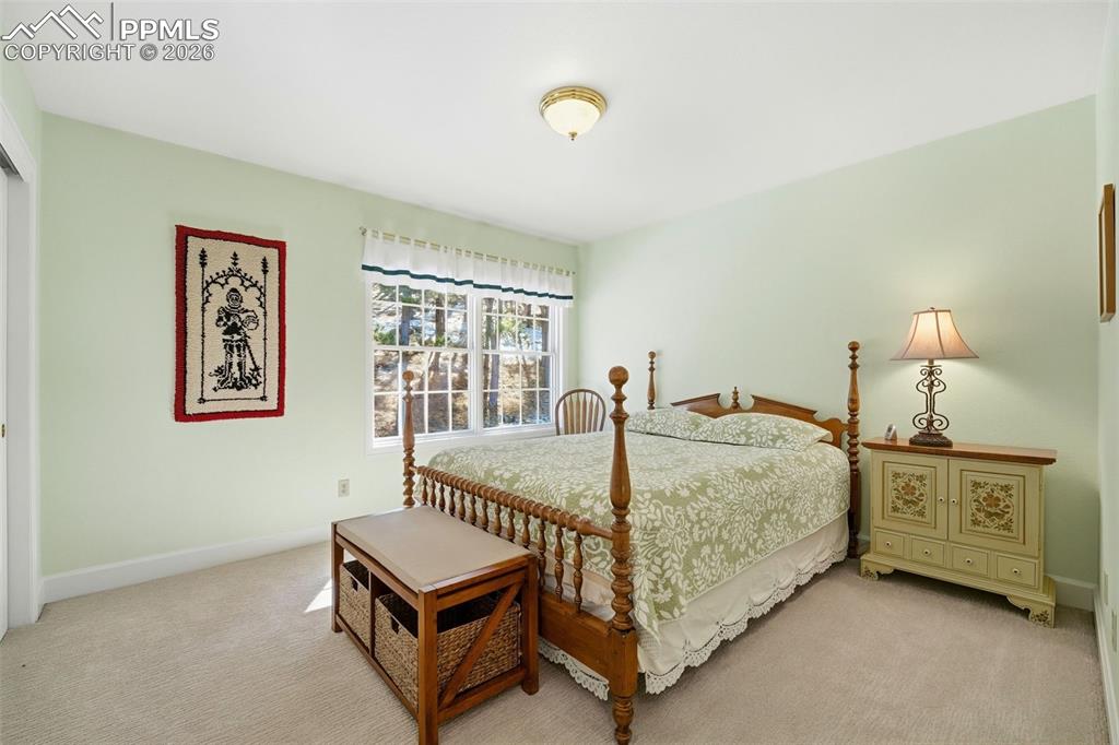 Image 21 of 47: Laundry on Main Level with Cabinets and Folding Area