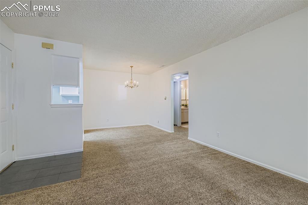 Image 6 of 23: Living Room looking at Dining area