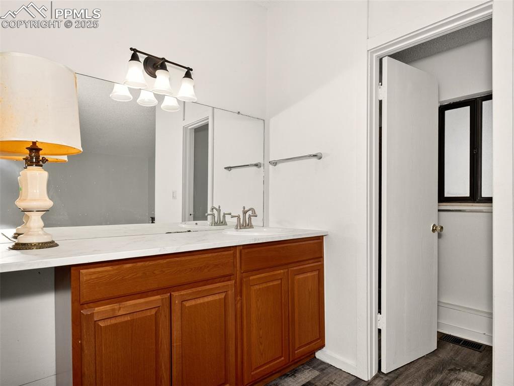 Image 18 of 44: Master bathroom with walk-in closet space and seperate shower