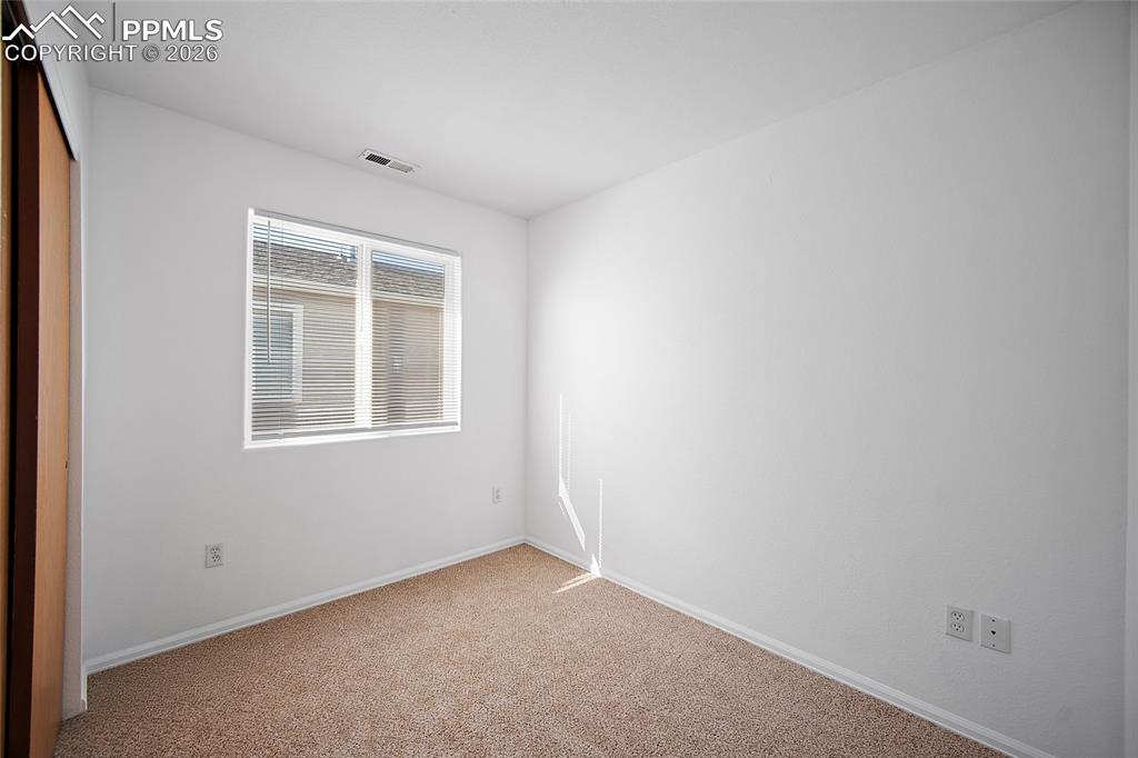 Image 20 of 28: Bedroom