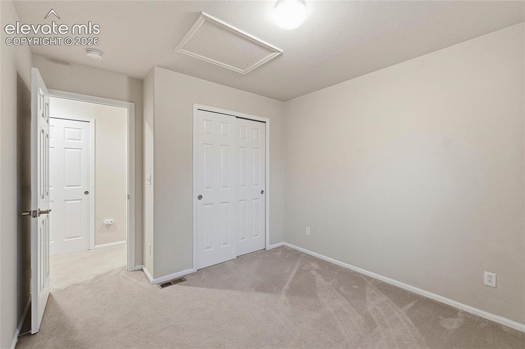 Image 18 of 28: Bedroom