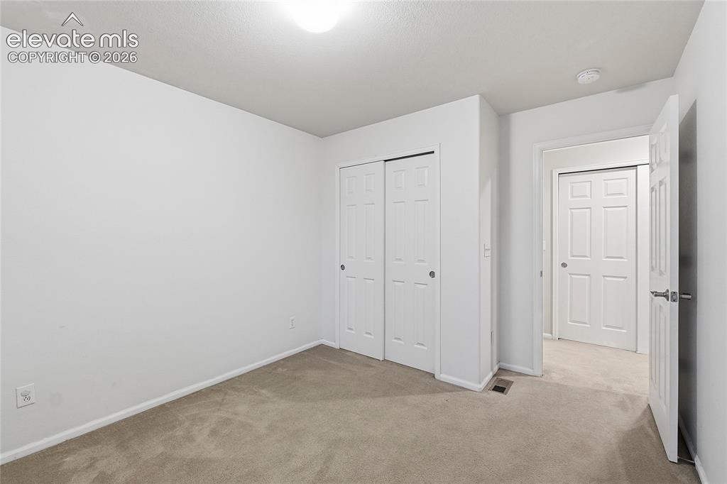 Image 20 of 28: Bedroom