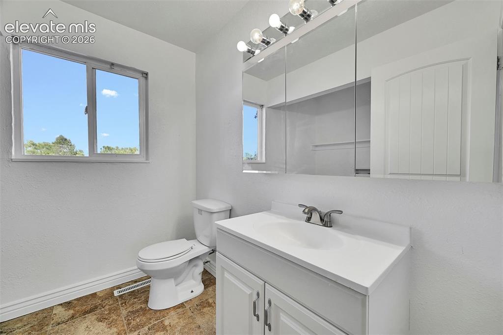 Image 13 of 25: Half bath on main level
