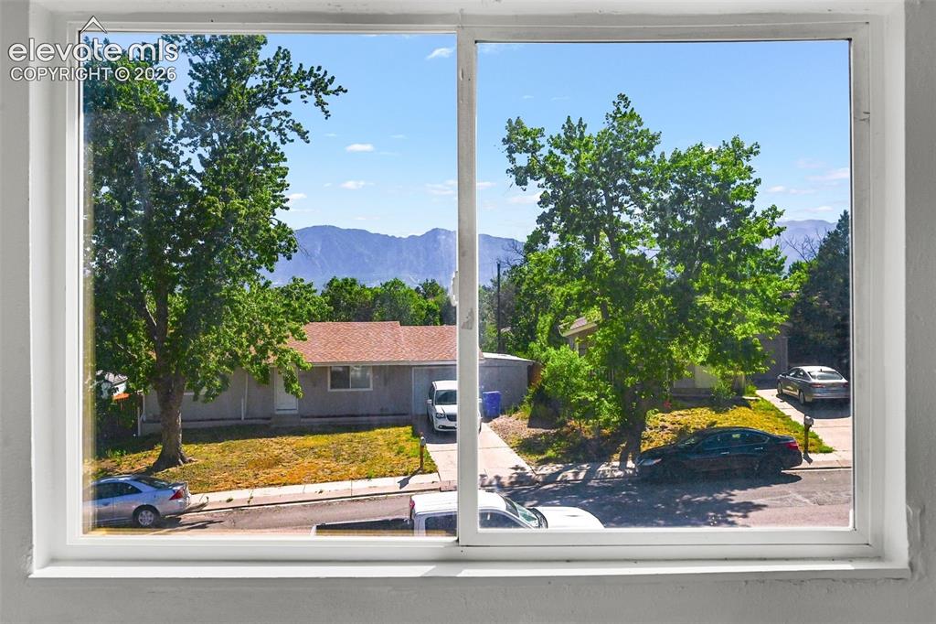 Image 4 of 25: Mountain views from the front side of the house