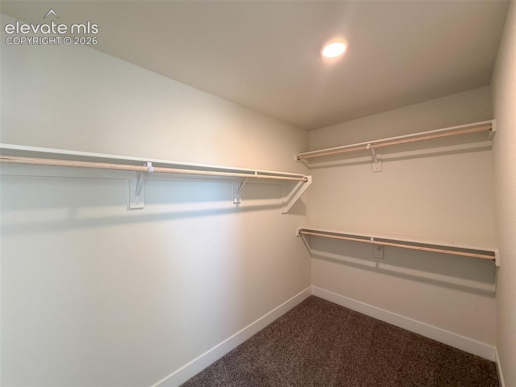 Image 26 of 42: Dual primary closets 