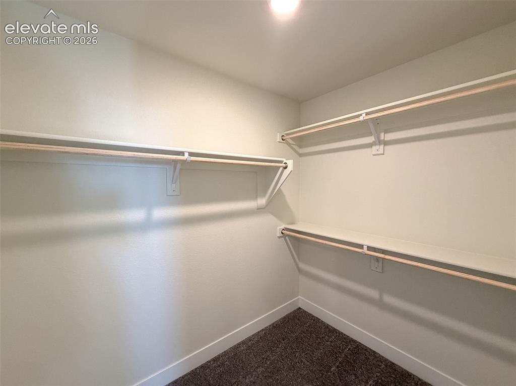 Image 29 of 42: Dual primary closets 