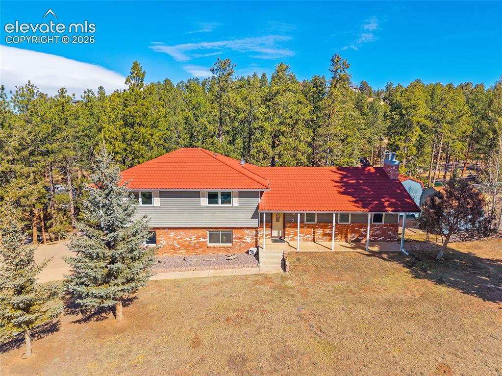 Image 1 of 50: Sitting on a private .82-acre lot that has been fully mitigated.
