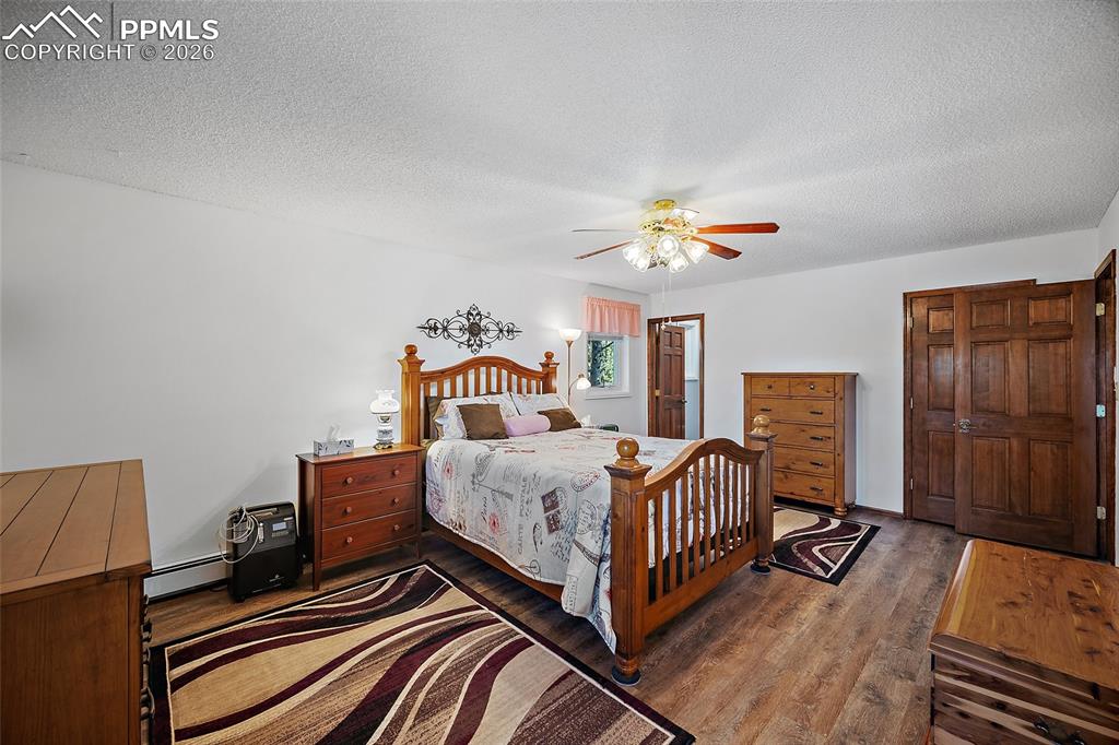 Image 23 of 49: Large Primary bedroom with adjoining upgraded bath.