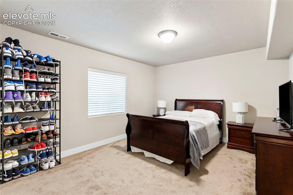 Image 31 of 38: Bedroom