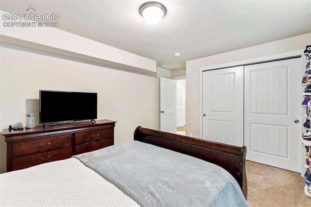Image 32 of 38: Bedroom