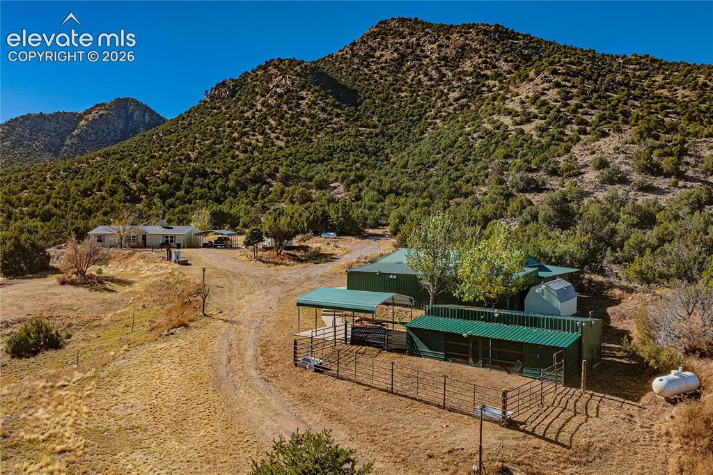 Image 33 of 48: Property view of mountains with a rural view