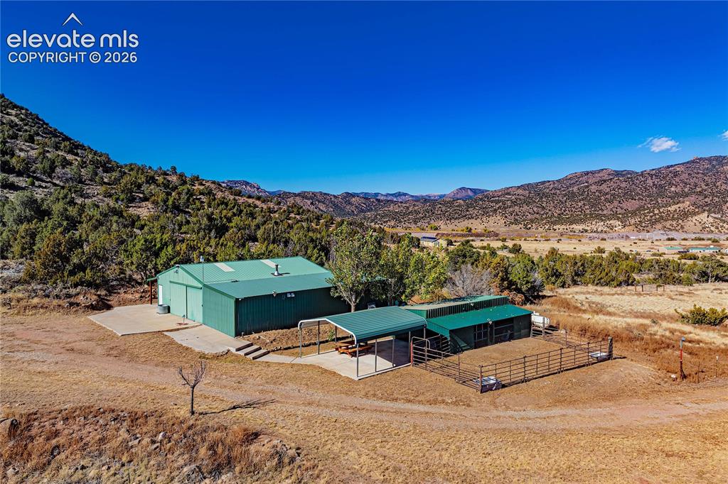 Image 5 of 48: Property view of mountains with a rural view