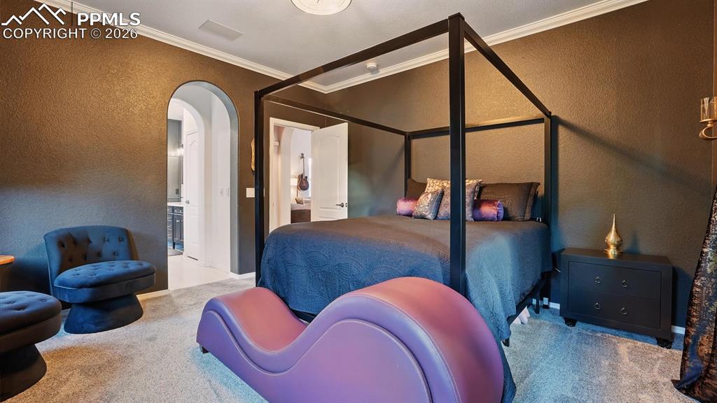 Image 21 of 50: Primary Suite into the 5pc Spa Bathroom.