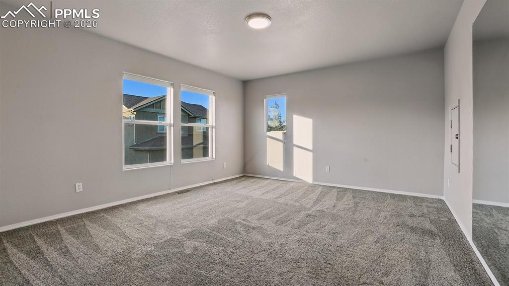 Image 31 of 50: Versatile Upper Level Family Room.