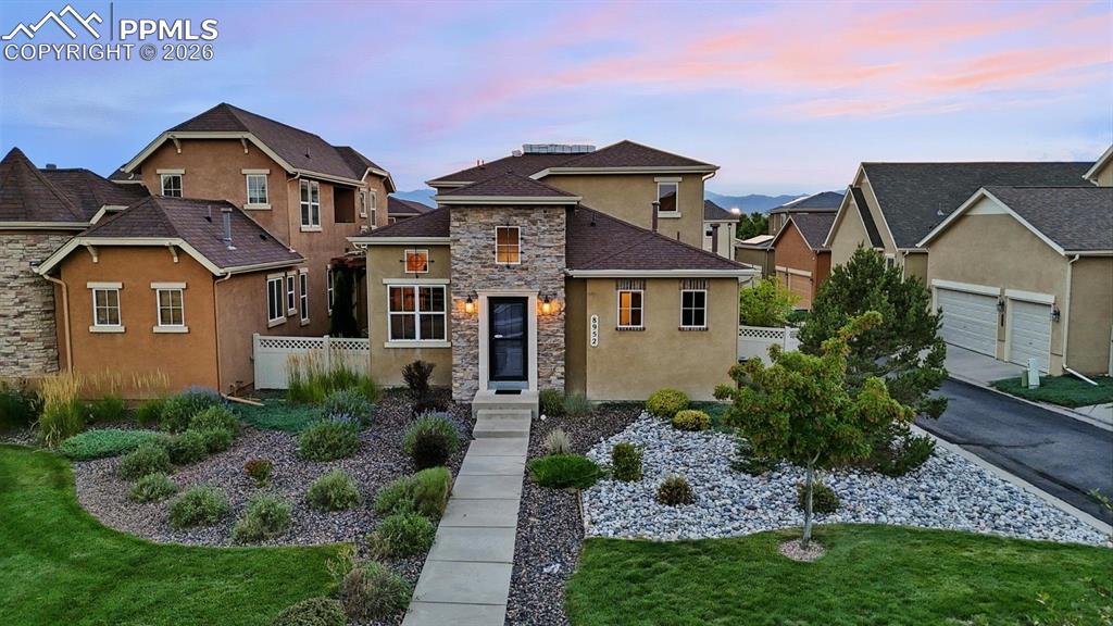 Image 5 of 50: Beautiful low maintenance landscaping.