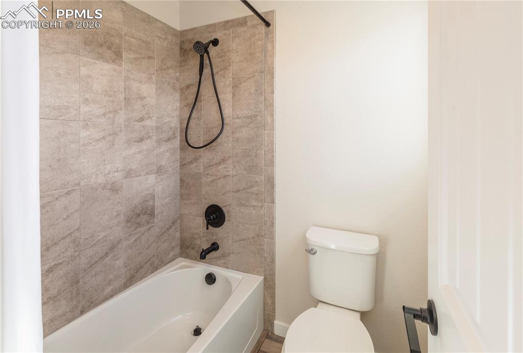 Image 40 of 50: ...and a tub/shower combination.