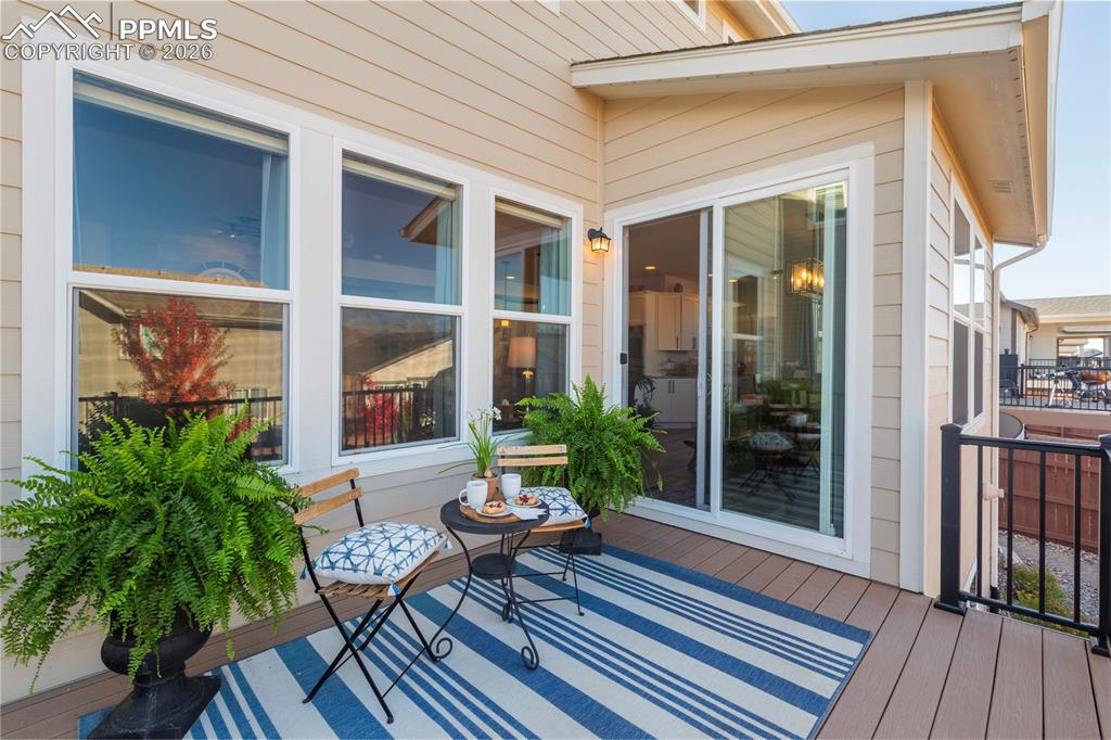 Image 5 of 50: Walkout slider from living, dining, kitchen area.