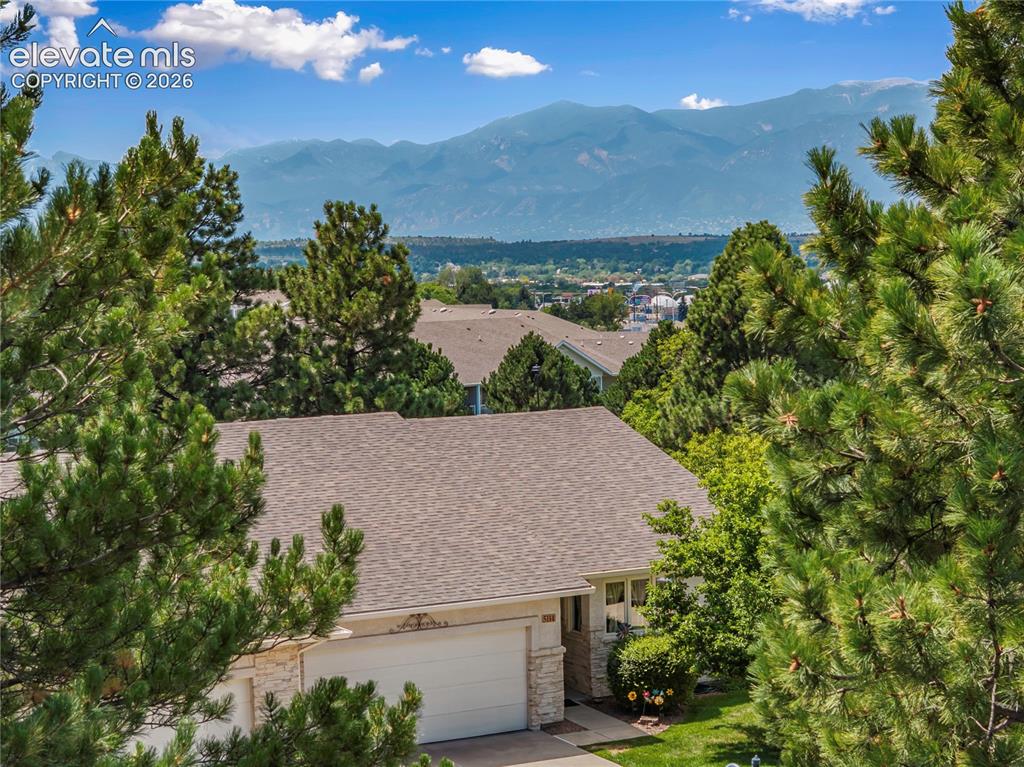 Image 12 of 43: The location is ideal and this unit has great mountain views!