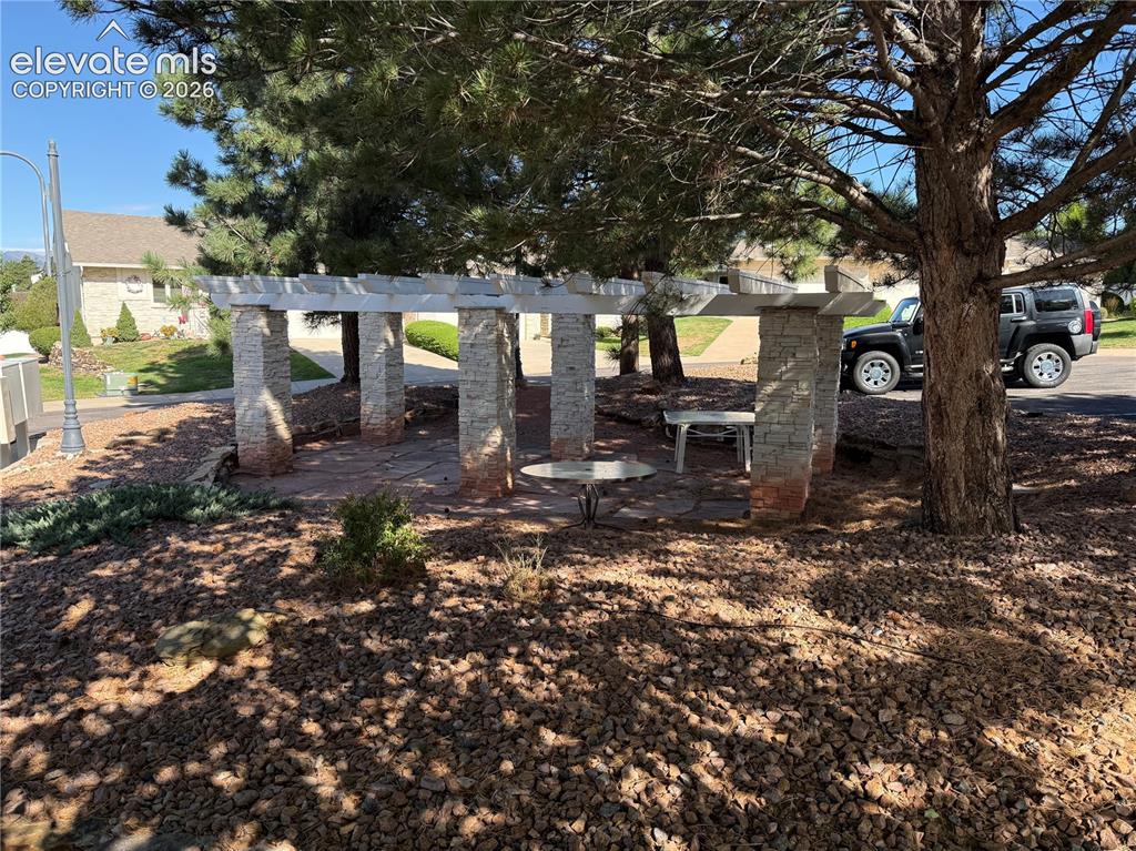 Image 13 of 43: Lovely pergola/picnic area in the community!