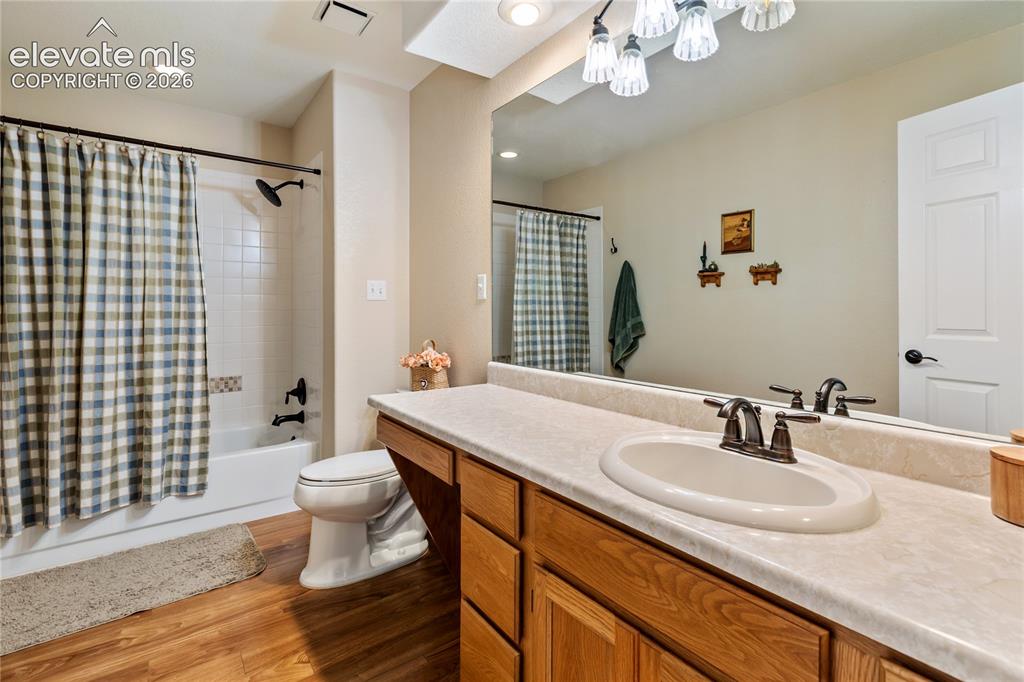 Image 39 of 43: Main level hall bathroom