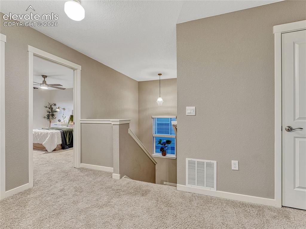 Image 30 of 45: Primary suite, upper level