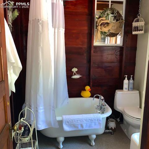 Image 13 of 33: original clawtub and refurbished sink...