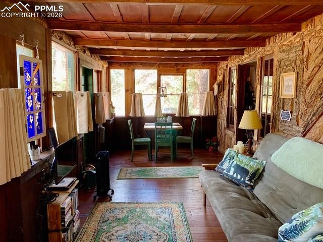Image 15 of 33: Filled with natural wood character complete with a pellet stove and lots of