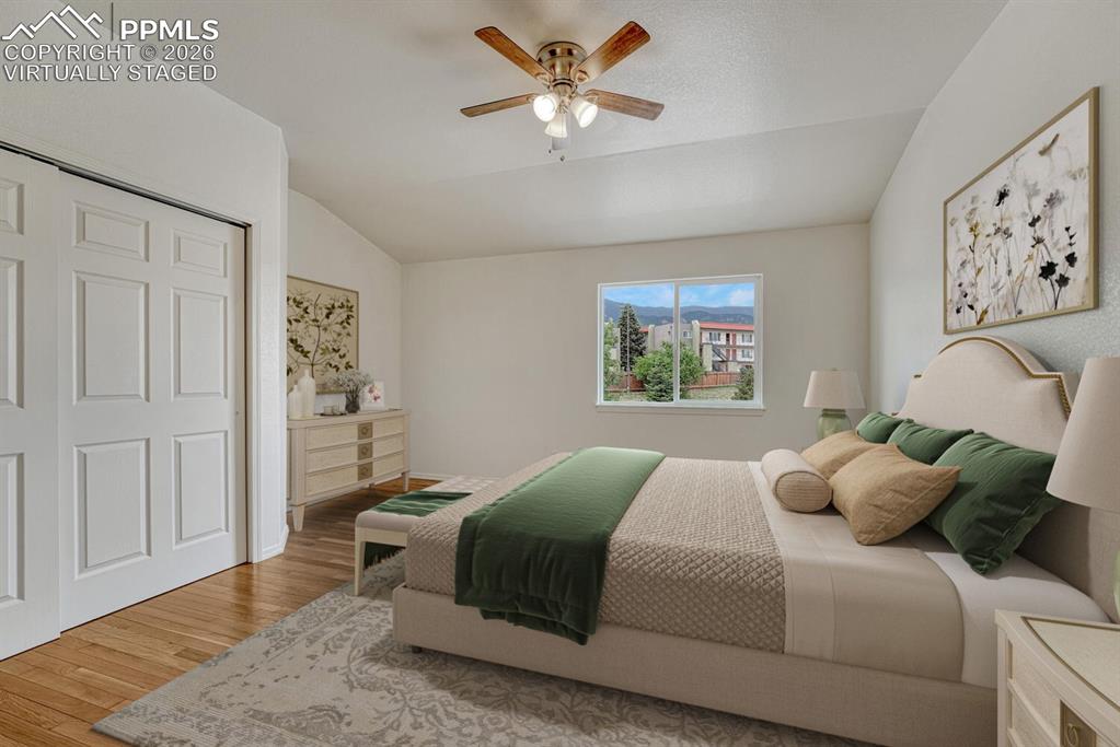 Image 15 of 50: Primary bedroom virtually staged