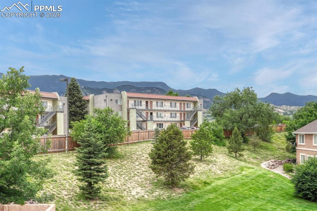 Image 16 of 50: Mountain view from primary bedroom