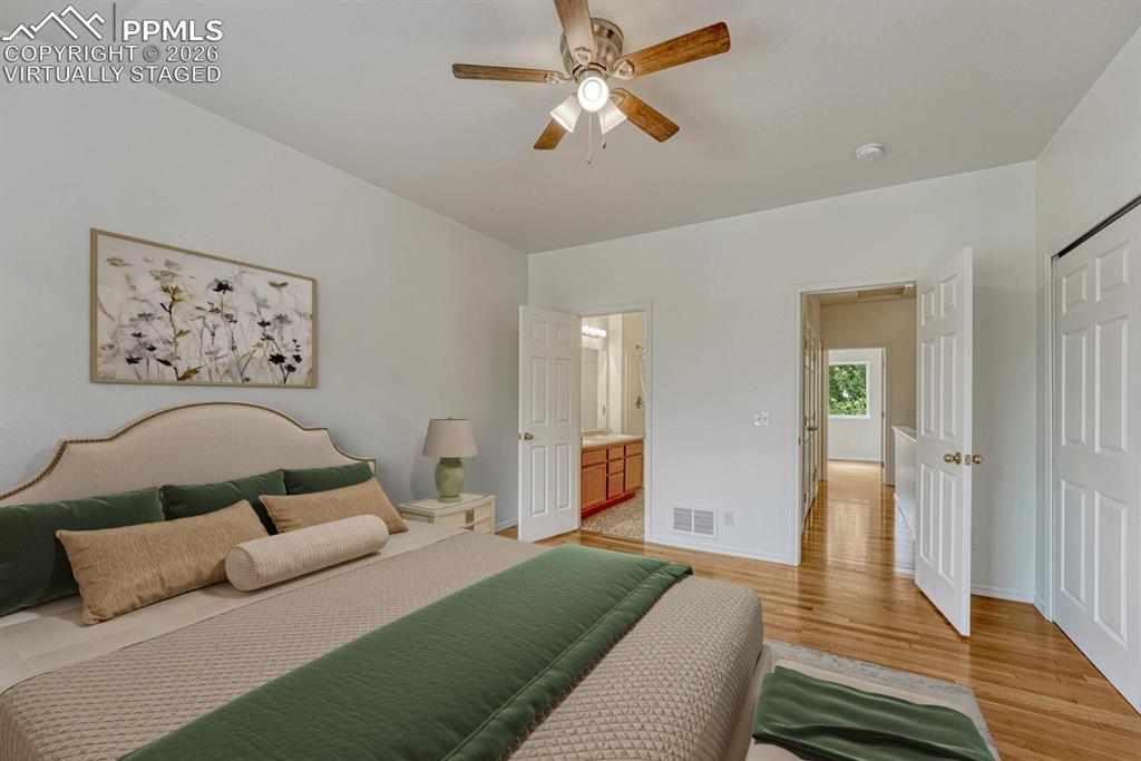 Image 17 of 50: Primary bedroom virtually staged