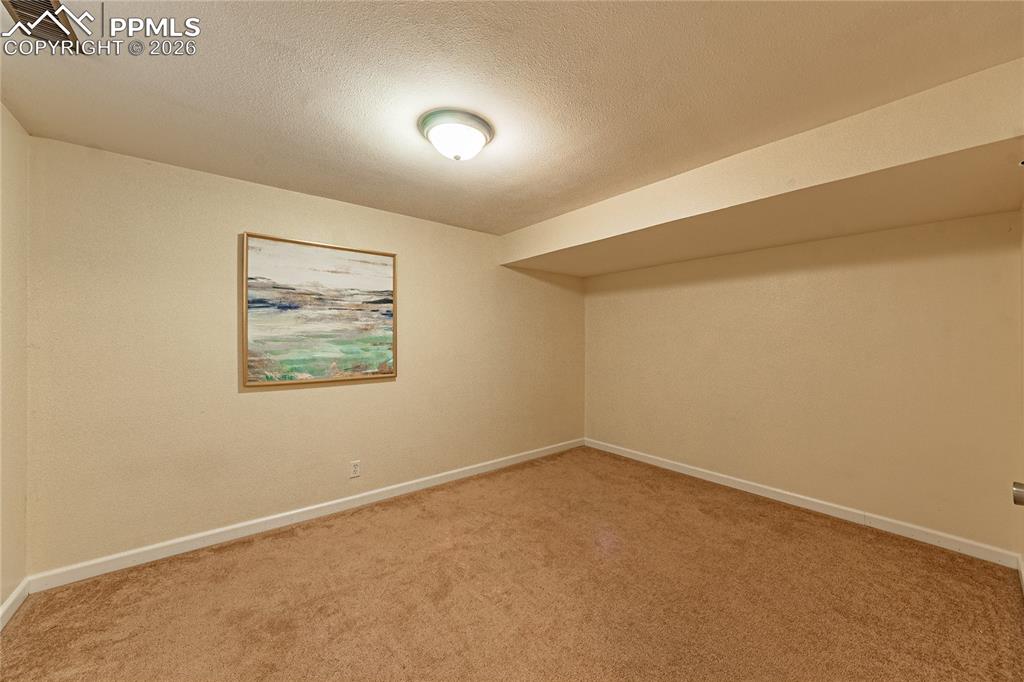 Image 31 of 49: 4th Bedroom in basement (2nd largest)