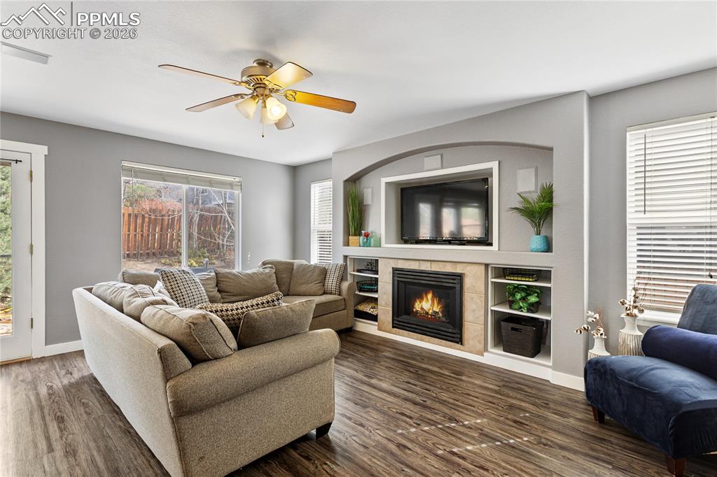 Image 13 of 38: Great room concept family room w/ gas fireplace and built ins