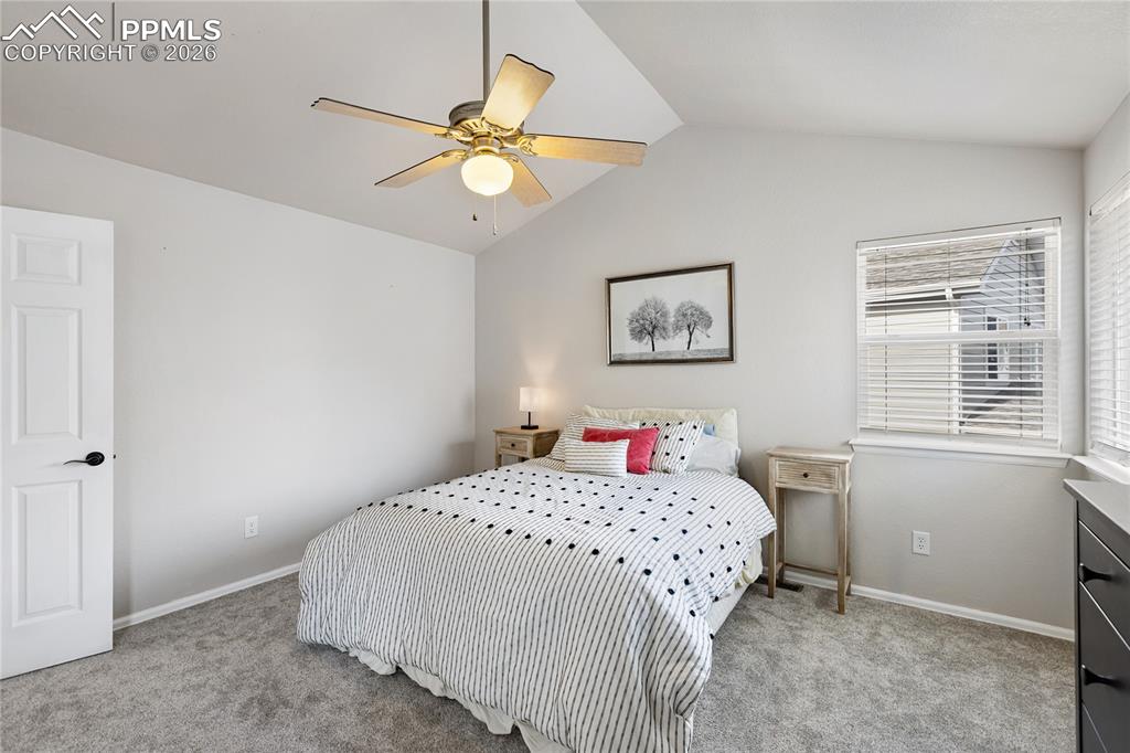 Image 17 of 38: Primary ensuite with vaulted ceilings