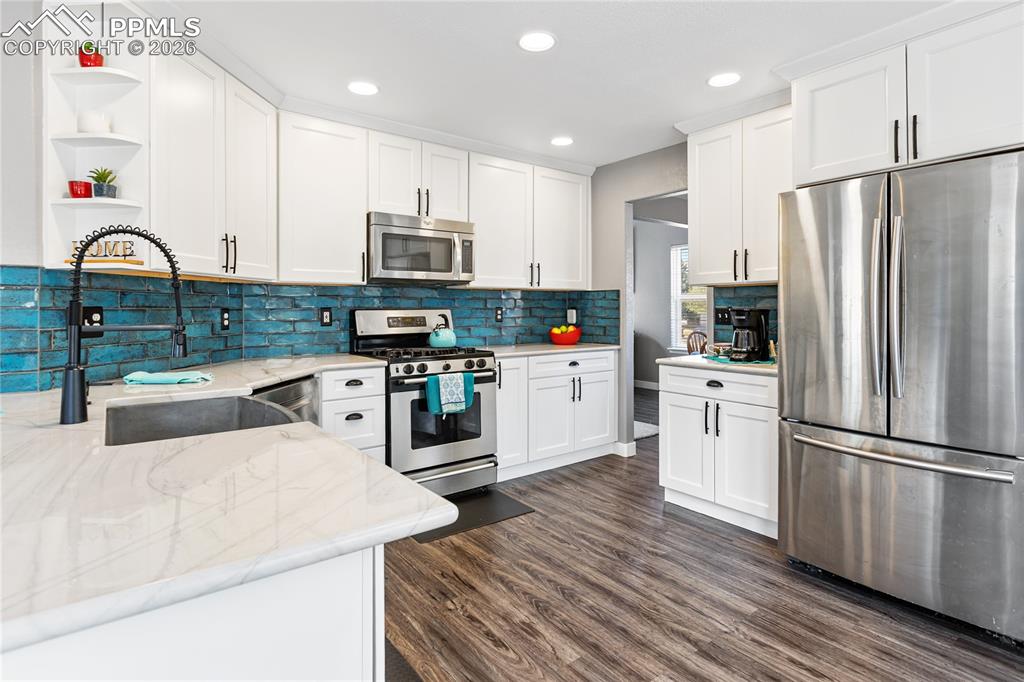 Image 2 of 38: Brand new custome kitchen w/ shaker cabinets and quartz counter tops