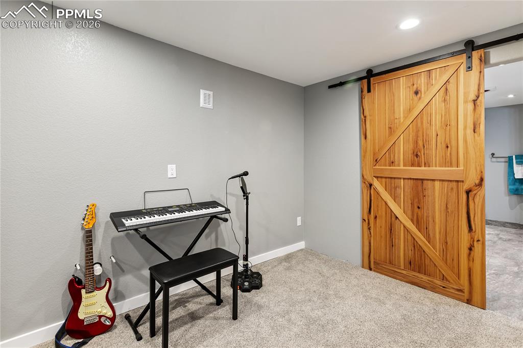 Image 32 of 38: rec room w/ kitchenette plumbing