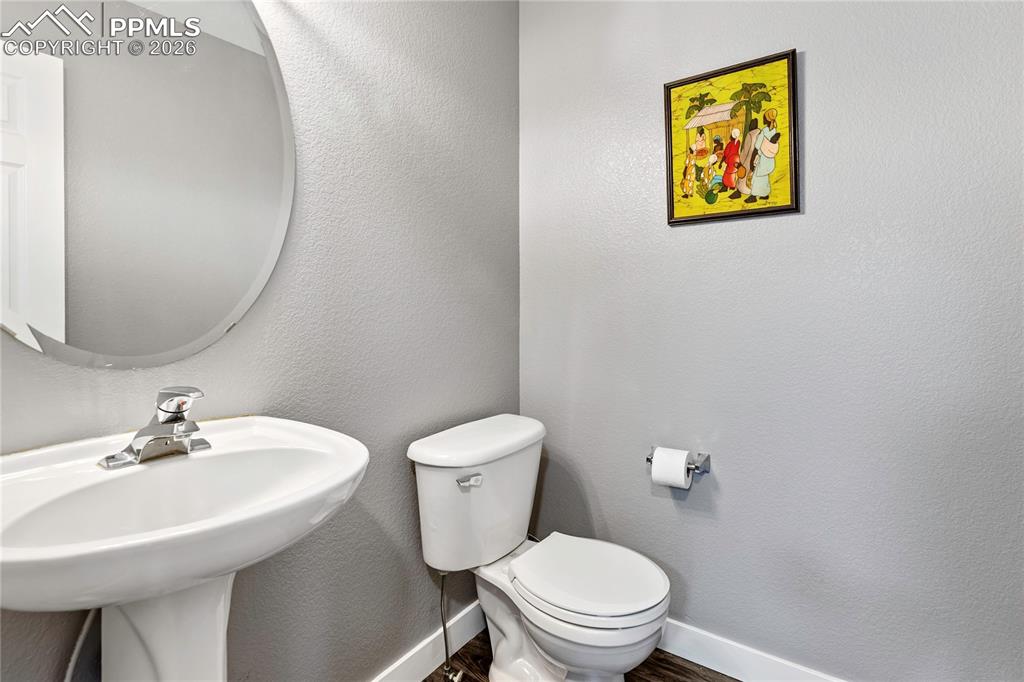 Image 33 of 38: 1/2 bath main level