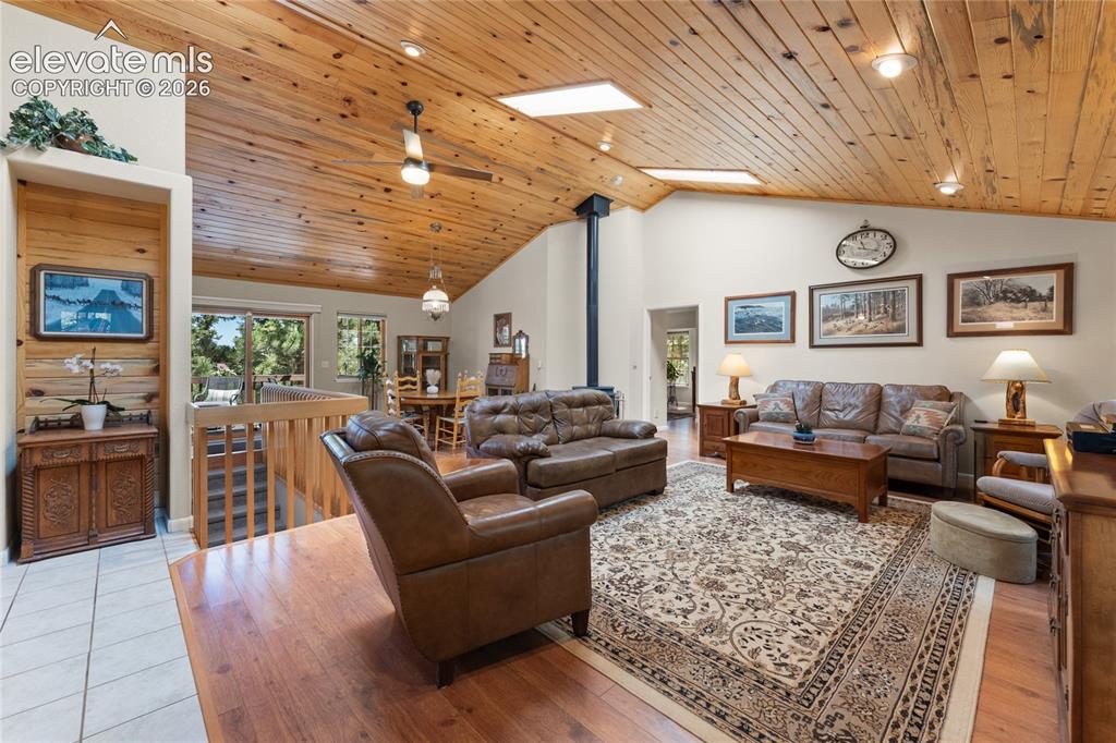 Image 5 of 43: Vaulted wood-plank ceilings featuring skylights and recessed lighting