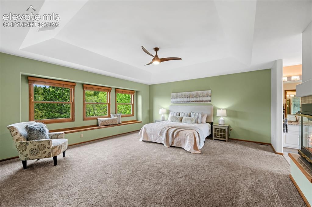 Image 13 of 36: Main level open concept kitchen, dining area and formal dining room